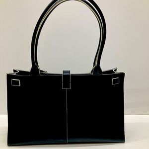 Wilson’s leather tote w/laptop sleeve black 26” strap
